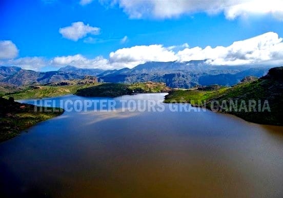 Helicopter over Gran Canaria lakes and mounta Helicopter over Gran Canaria lakes and mountains