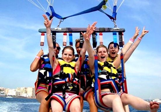 Parasailing over Ibiza waters Parasailing over Ibiza waters